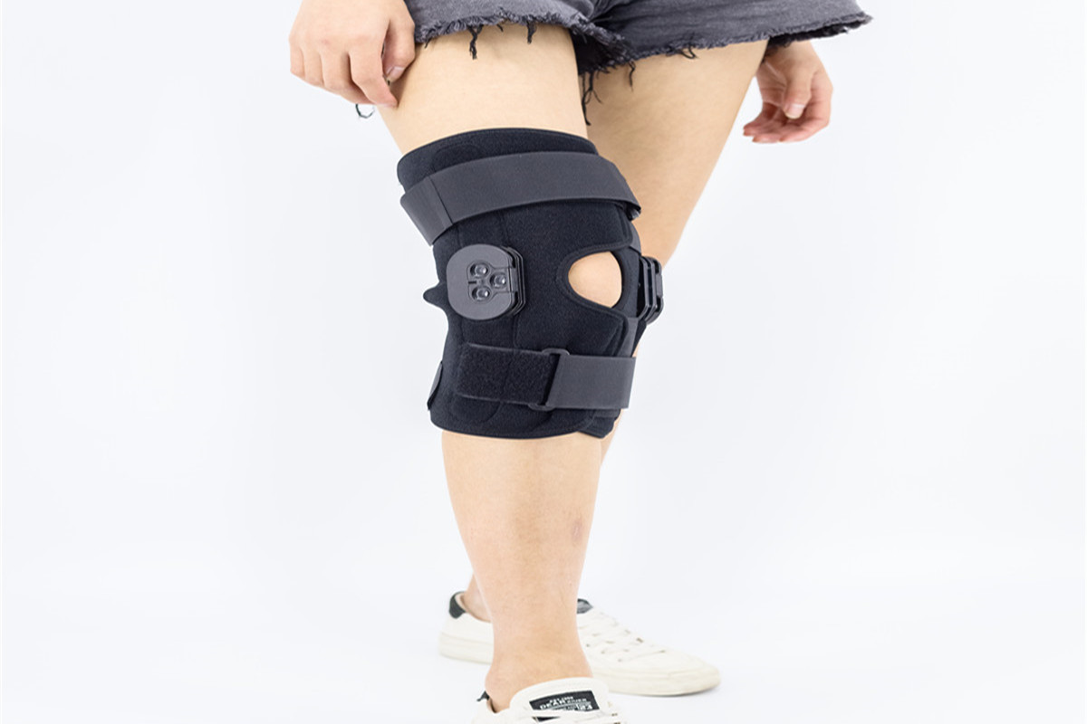 ACL zawiasowy kolano wraparound ok tkaniny Laminowany oddychający neoprenowa liniowiec z otwartym paterem